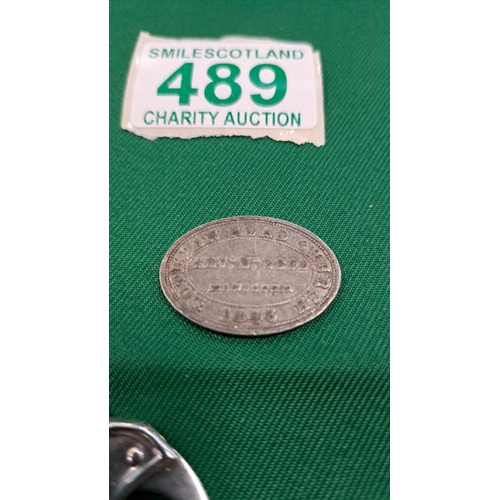 489 - Lothian road church token 1846 and a vintage corkscrew and a sugar pinch