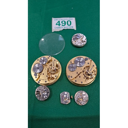 490 - a selection of watch spares