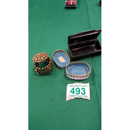 493 - snuff box , cloisonné pill box and a napkin holder for one .