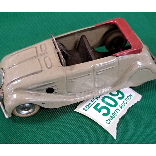 509 - 2 vintage Tri-ang model cars , both wind up (wynd) see photos