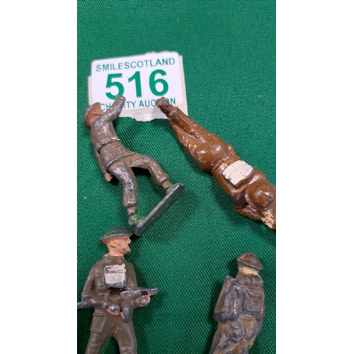 516 - a selection of metal toy soldiers.