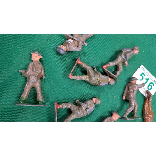 516 - a selection of metal toy soldiers.