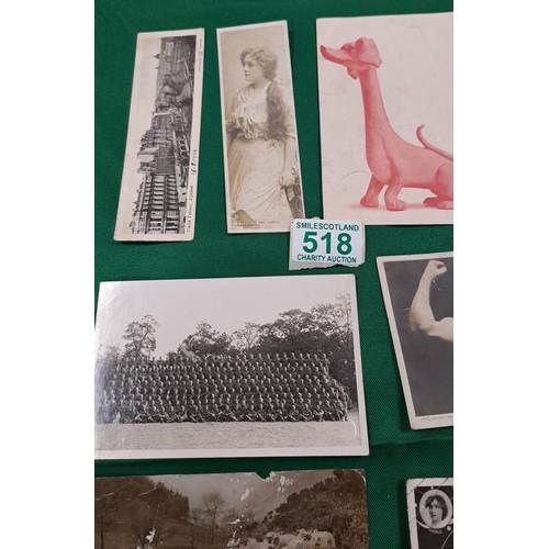 518 - A selection of vintage postcards