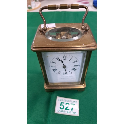 527 - vintage  Brass Carriage clock retailed by E Sermon Torquay 4 glass panel carriage clock and working