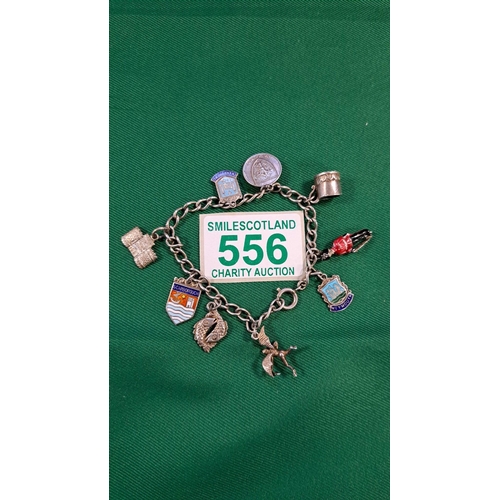 556 - Vintage Sterling Silver Charm Bracelet and Charms