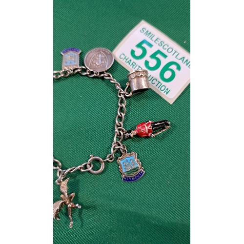 556 - Vintage Sterling Silver Charm Bracelet and Charms