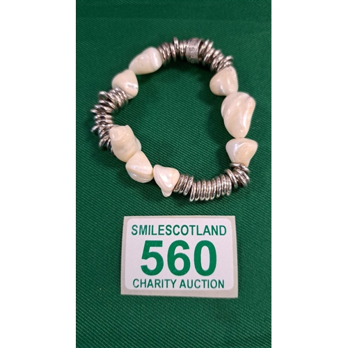 560 - 2 necklaces and a bracelet marked Links of London