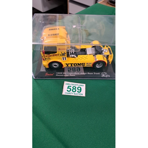 589 - 4 x siaco racing Lorry models in cases