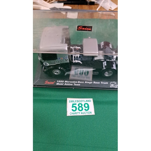 589 - 4 x siaco racing Lorry models in cases