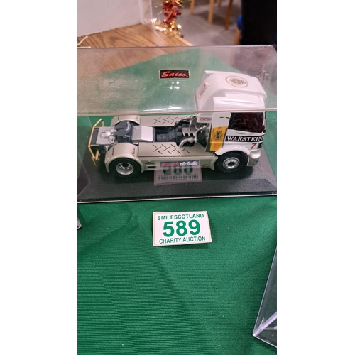 589 - 4 x siaco racing Lorry models in cases