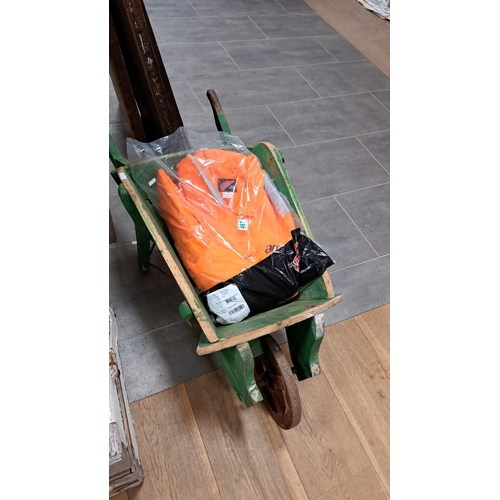 487 - Vintage small wheel barrow and redwing overall