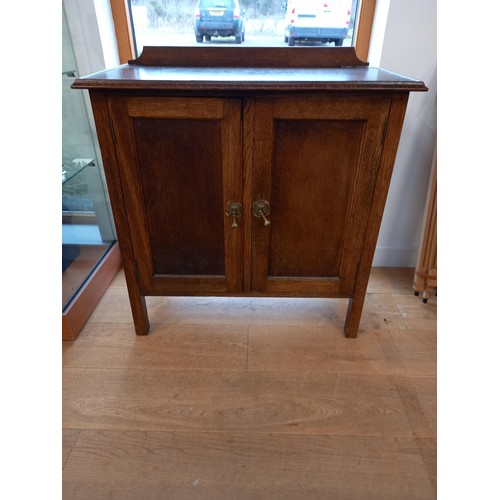 65 - Small oak 2 door side cupboard, 78cm H approx.