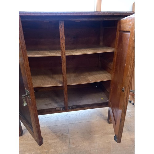 65 - Small oak 2 door side cupboard, 78cm H approx.