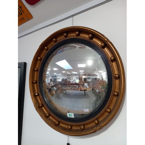 67 - Convex circular mirror, mid 20c England