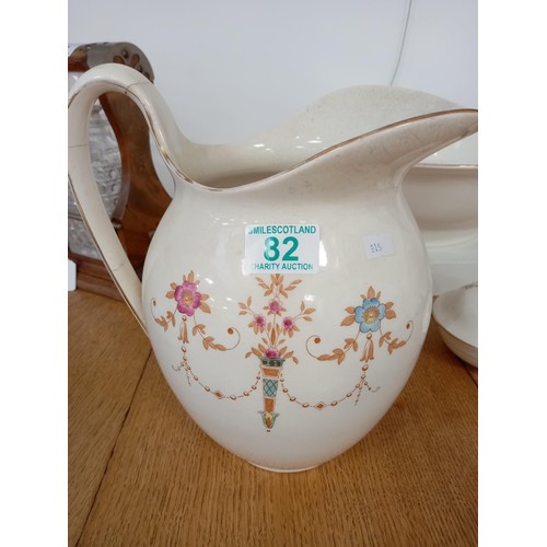 82 - Bowl, pitcher and soap dish