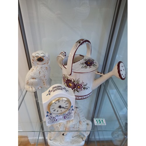 151 - Porcelain watering can clock and a wally dug