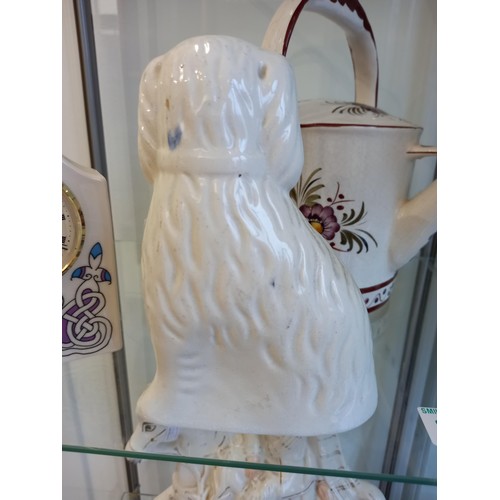 151 - Porcelain watering can clock and a wally dug