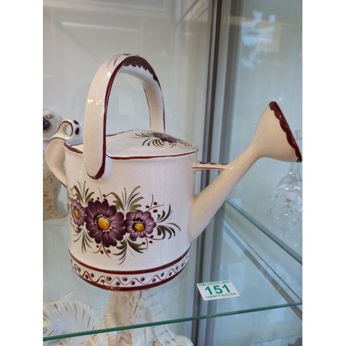 151 - Porcelain watering can clock and a wally dug