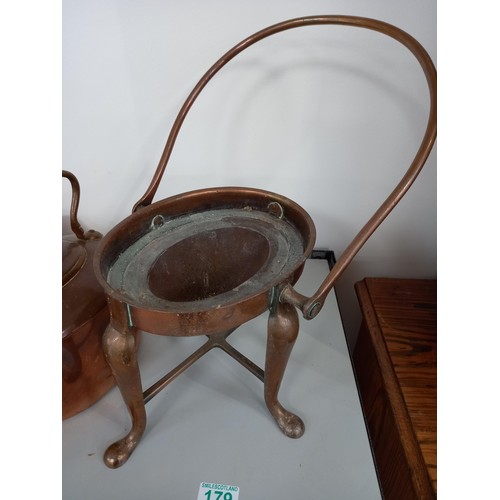 179 - Copper kettle on a heating stand