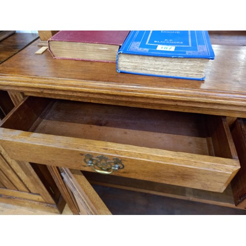 186 - Oak dresser with mirror and book storage