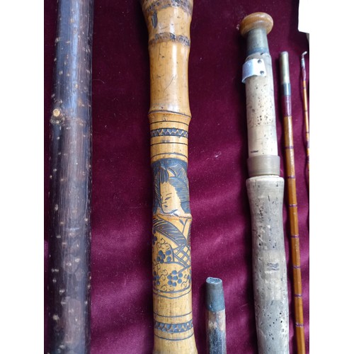 325 - Fishing Rod Sharpes split cane, and walking sticks, some ornate