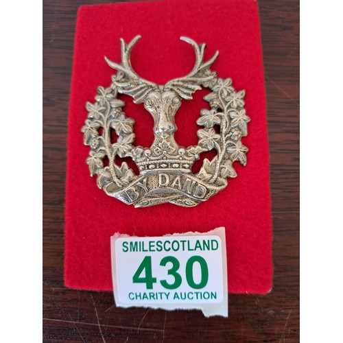 430 - ByDand  Gordon Highlanders large cap badge  and Argyll and Sutherland.