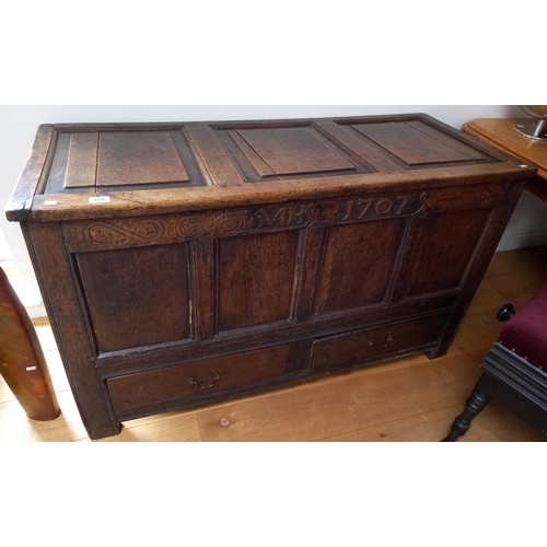 69 - Believed Circa late 17th/ early 18th C blanket box with 2 drawers, although carved with 1707 the auc... 