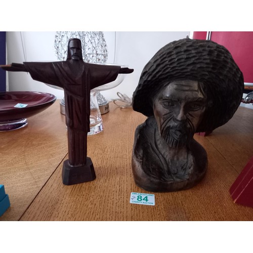 84 - 2x wooden carvings Rio De Janero style 'Christ' and Man with hat smoking bust