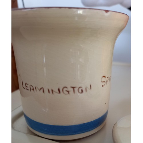 97 - 3x Devon motto ware style vase 10cm H approx. 'lest we forget'. Lidded jar 8cm H approx. 'Leamington... 