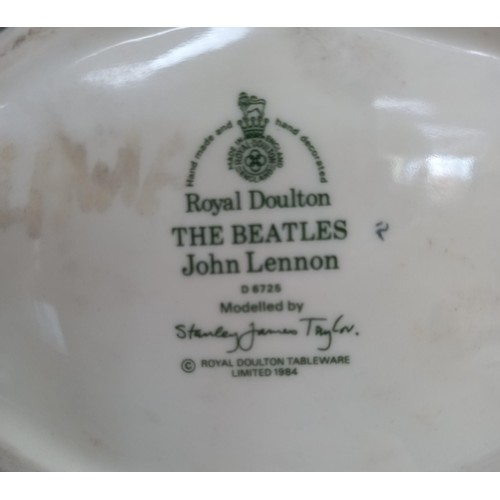 104 - Royal Doulton 1984 'The Beatles' Toby Jugs.  To include: Paul McCartney, John Lennon, Ringo Star and... 