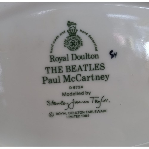 104 - Royal Doulton 1984 'The Beatles' Toby Jugs.  To include: Paul McCartney, John Lennon, Ringo Star and... 