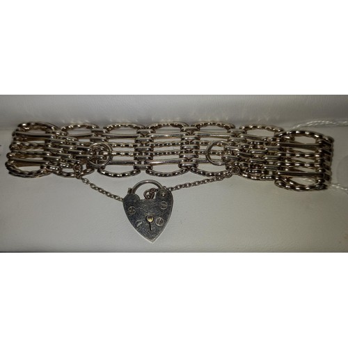 110 - Silver hallmarked gate bracelet. London 1976 WBS  24.7g approx.