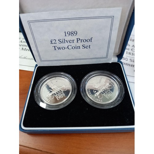 128 - Royal Mint 1989 £2 silver proof two coin set