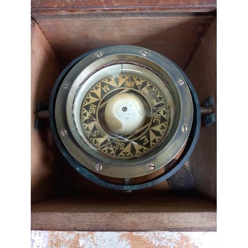 150 - Compass on gimble box by H Hughes & son London