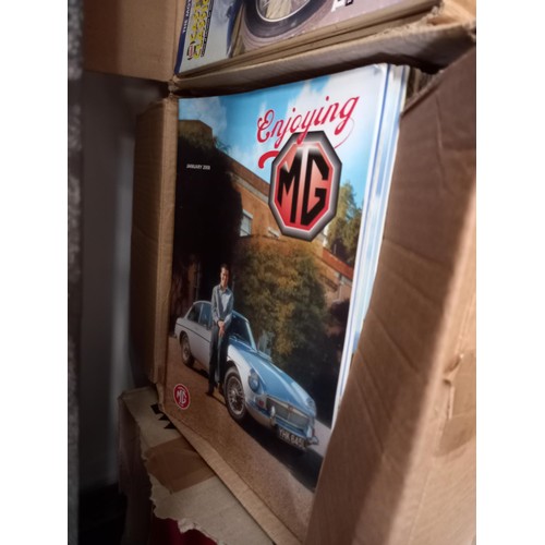 197 - Four boxes of MG car magazines throughout the years