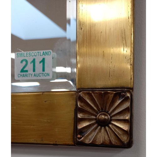 211 - Vintage bevelled mirror of good age metal surround 44x59cm approx.