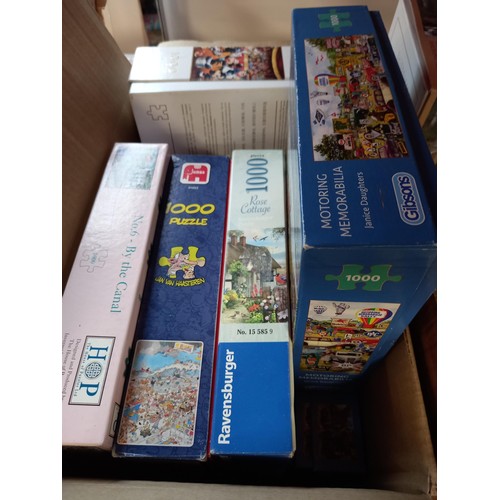 217 - Two boxes and one bag of Jigsaw puzzles