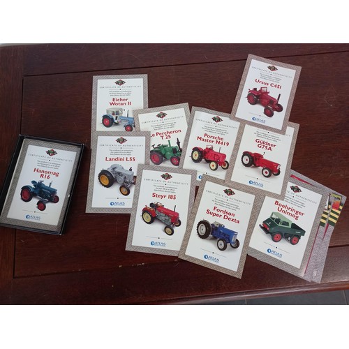 284 - Collection of 21 Atlas Edition model tractors, with certificates