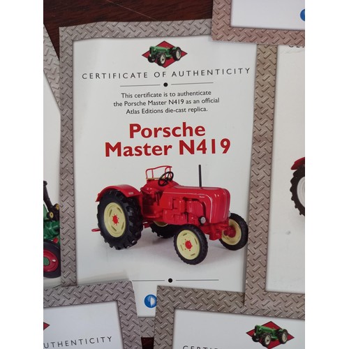 284 - Collection of 21 Atlas Edition model tractors, with certificates