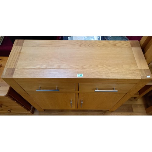 338 - Small oak sideboard with 2 drawers