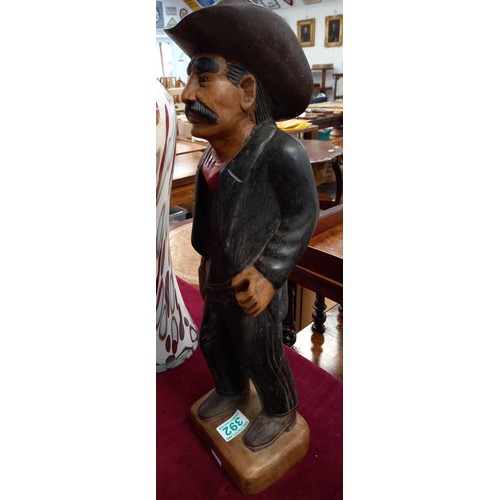 392 - wooden cowboy statue