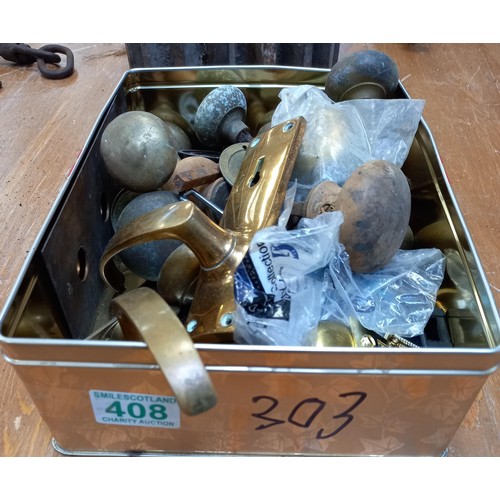 408 - Small box of vintage door handles etc.