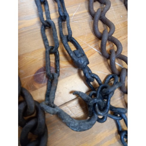 409 - Selection of vintage chains for farm/iron work