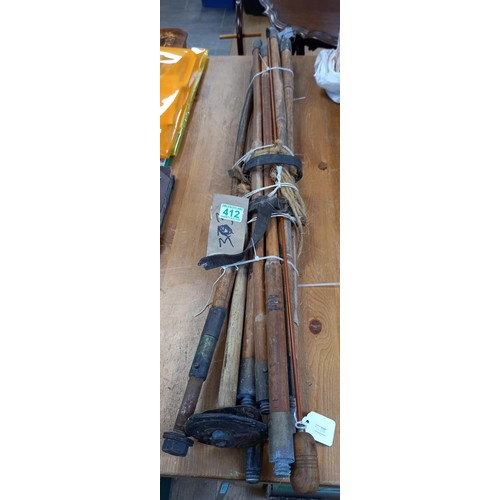 412 - Vintage bamboo Drain rods and 1 other