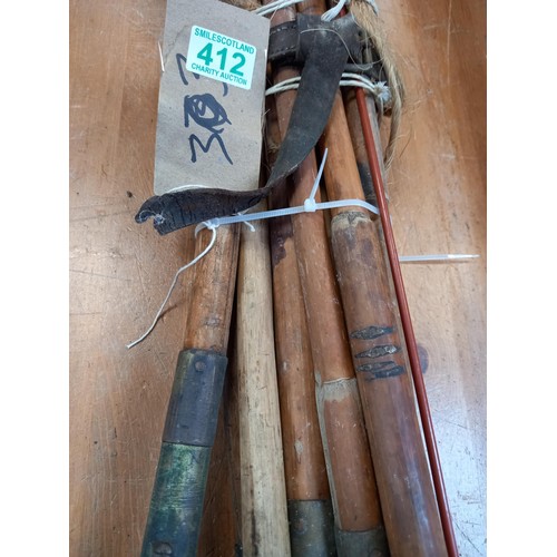 412 - Vintage bamboo Drain rods and 1 other