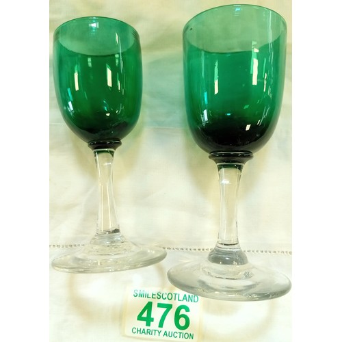 476 - A pair of early 19th Century coloured glasses.