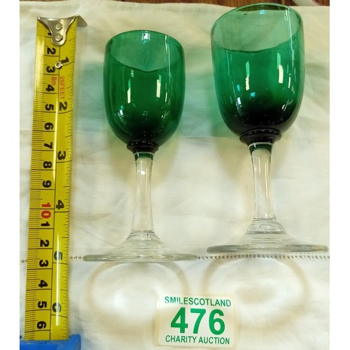 476 - A pair of early 19th Century coloured glasses.