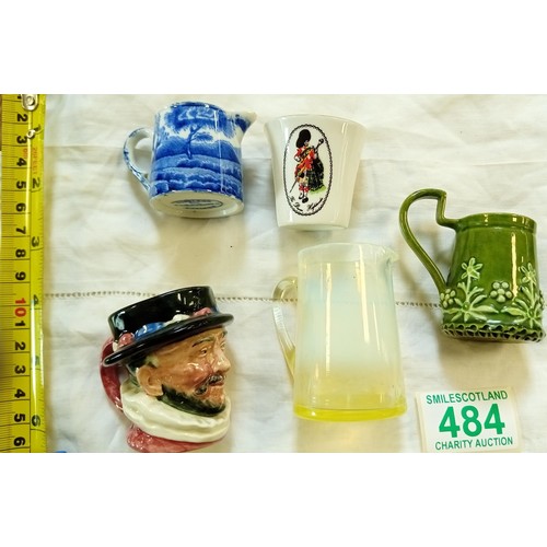 484 - A selection of small collectible jugs etc.