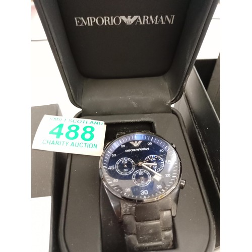 488 - emporio armani watch in box with receipt .. Direct from an unpaid storage container