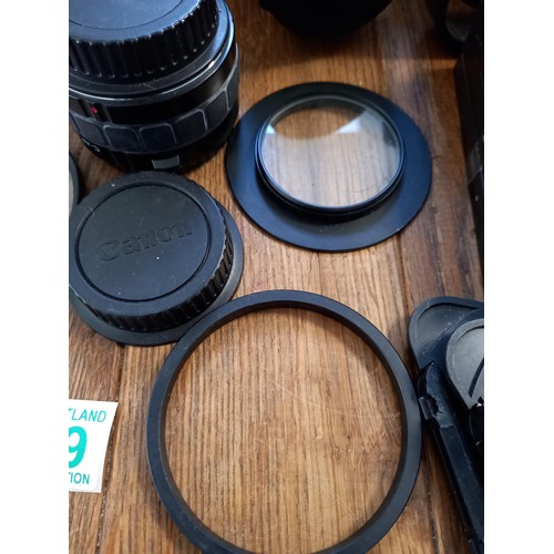 539 - Olympus om10 camera plus bag , coloured filters and 4 different lenses see photos